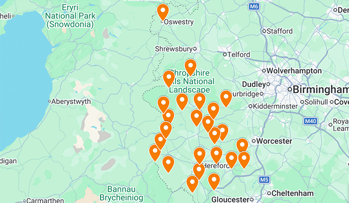 map of mid Wales and the Welsh borders with orange pointers indicating 25 festival venues