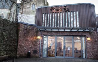 Modern glass-fronted theatre in courtyard